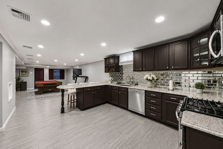 43. 5 Gates Pl Modern basement kitchen and lounge space