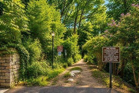 44. 35 Shore Serene woodland entrance with clear signage