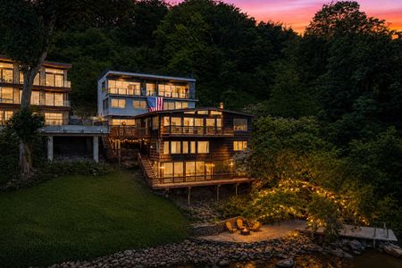 45. 35 Shore Sunset over lakeside hillside homes