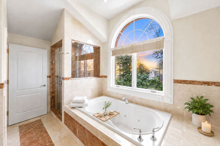 46. 335 Riverdale Elegant spa-inspired bathroom with sunset view