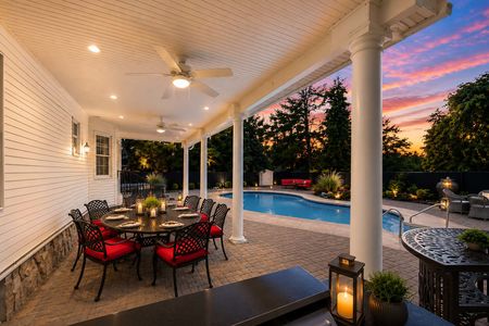 48. 5 Gates Pl. Twilight backyard oasis with pool