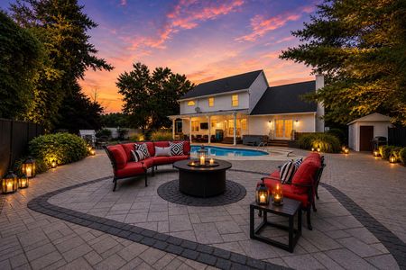 5. 5 Gates Pl Cozy backyard at twilight with lanterns