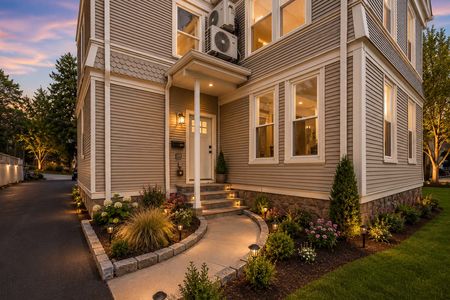 5. 69 E Clinton #A Cozy twilight exterior with inviting entry