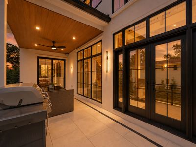 54. 14 Allison - Modern Patio Lit Up At Dusk
