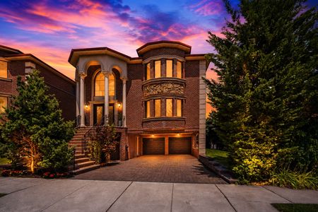 6. 335 Riverdale Elegant brick home at twilight