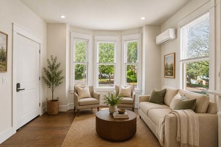 6. 67 E Clinton Cozy modern living room with greenery