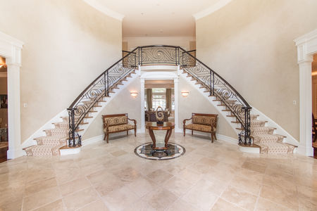 foyer and double bridle staircase at 159 Anderson Alpine New Jersey Proper