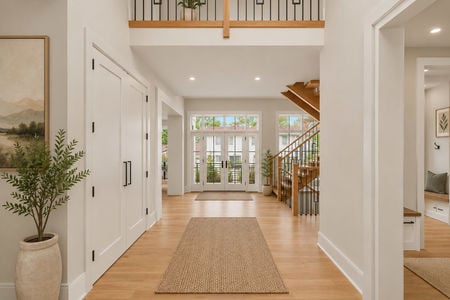 7. 14 Allison Bright and airy entryway with greenery