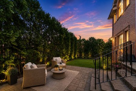 70. 335 Riverdale Cozy patio at twilight with sunset sky
