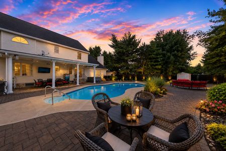 9. 5 Gates Pl. Serene backyard patio at sunset