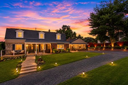 9. 933 River Rd.Welcoming dusk at a suburban home