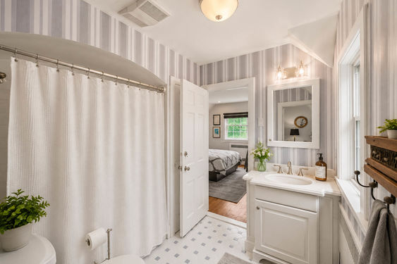 0.50 16 N Brae Bright Neutral Bathroom with Bedroom View