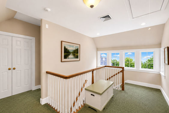 0.52a 16 N Brae Bright Upstairs Landing with Windows and Stair Railing