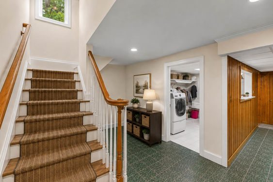 0.56 16 N Brae Bright Modern Basement Hallway and Laundry Area