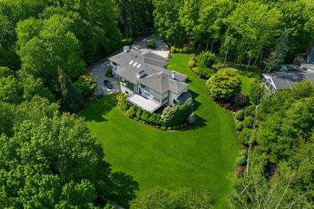0.6. 1 Lambs Aerial view luxury home