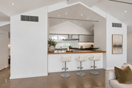 16. 23 Shore Bright Modern Kitchen with Warm Wood Accents