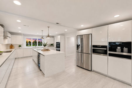 19. 108 Briarwood Modern White Kitchen at Sunset