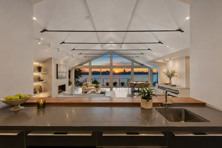 19. 23 Shore Modern Waterfront Interior at Sunset