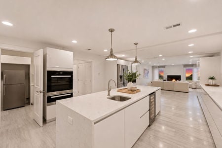 21. 108 Briarwood Modern Open-Plan Kitchen at Sunset