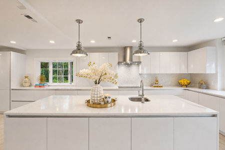 25. 108 Briarwood Bright Modern White Kitchen with Gold Accents