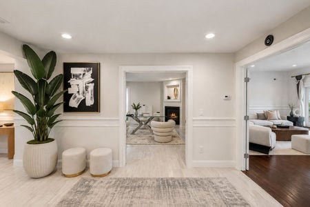 30. 108 Briarwood Modern Neutral Foyer with Tropical Accents