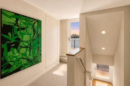 37. 23 Shore Modern Landing with Sunset Skyline View