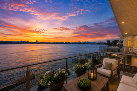 4. 23 Shore Luxurious Waterfront Balcony at Sunset