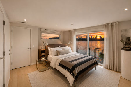 43. 23 Shore Zen Bedroom Overlooking Sunset Cityscape