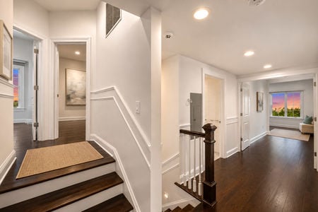 45. 108 Briarwood Sunset Glow in a Bright Upstairs Hallway