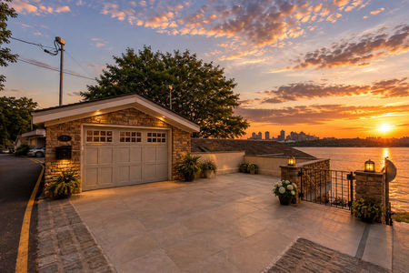 49. 23 Shore Sunset Waterfront Boathouse and City Skyline
