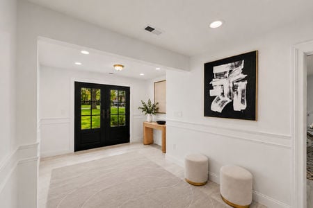 9. 108 Briarwood Modern Minimalist Foyer with Black French Doors