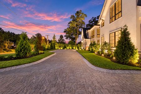 0.03 Paver Driveway at 90 Essex Dr, Tenafly NJ Exterior at Twilight
