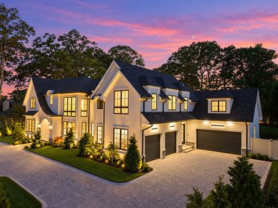 0.04 Garage at 90 Essex Dr, Tenafly NJ Exterior at Twilight