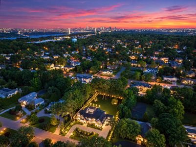 0.07 Aerial twilight of 90 Essex Dr, Tenafly NJ Exterior at Twilight