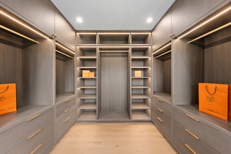 37 Primary Closet with lighting built in