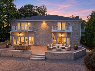 8 The back patio, staged at twilight
