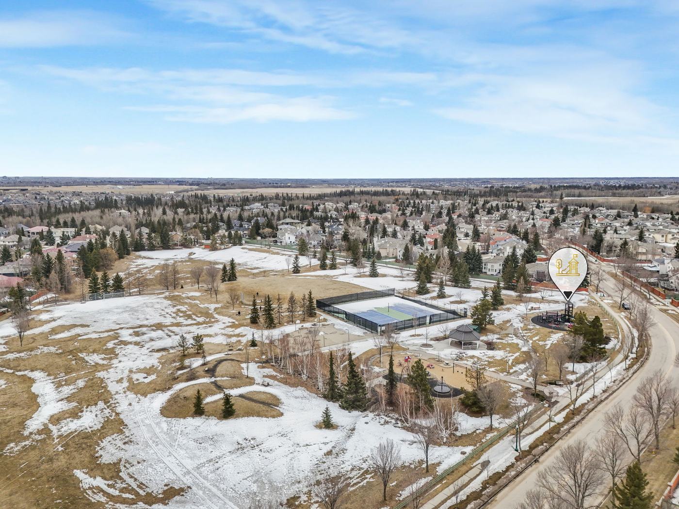 Aerial view of the community tennis and pickleball courts within the neighbourhood.