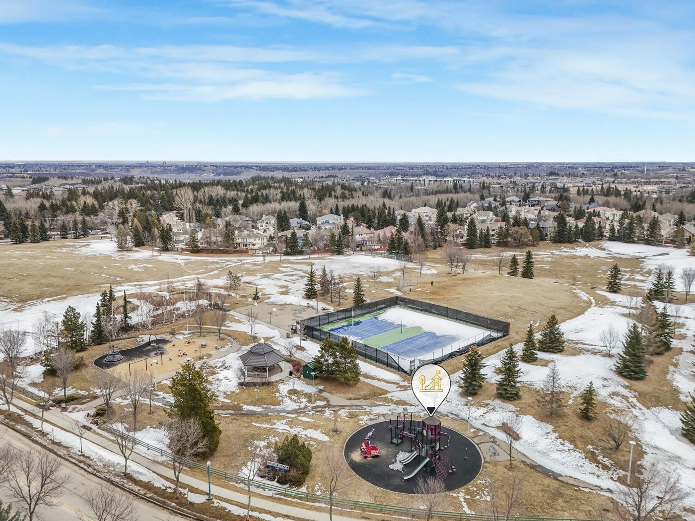 Aerial view of the community playground, gazebo and fountain in the neighbourhood green space.