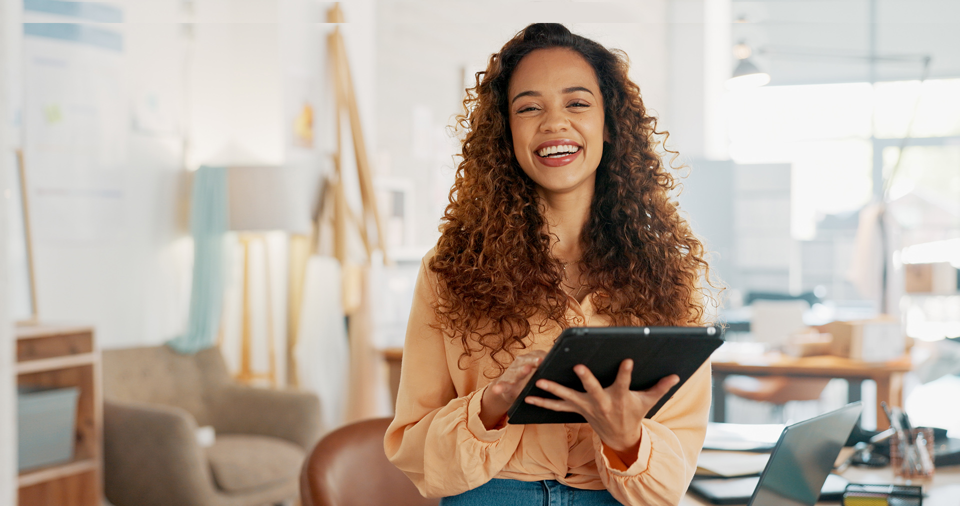 Portrait, tablet and black woman designer in an office for planning, strategy or creative research. Technology, smile and online order with a young employee or small business owner in a workplace