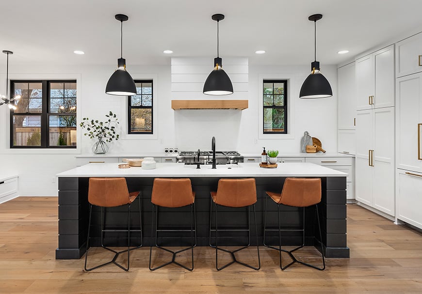 Modern kitchen with island and chairs
