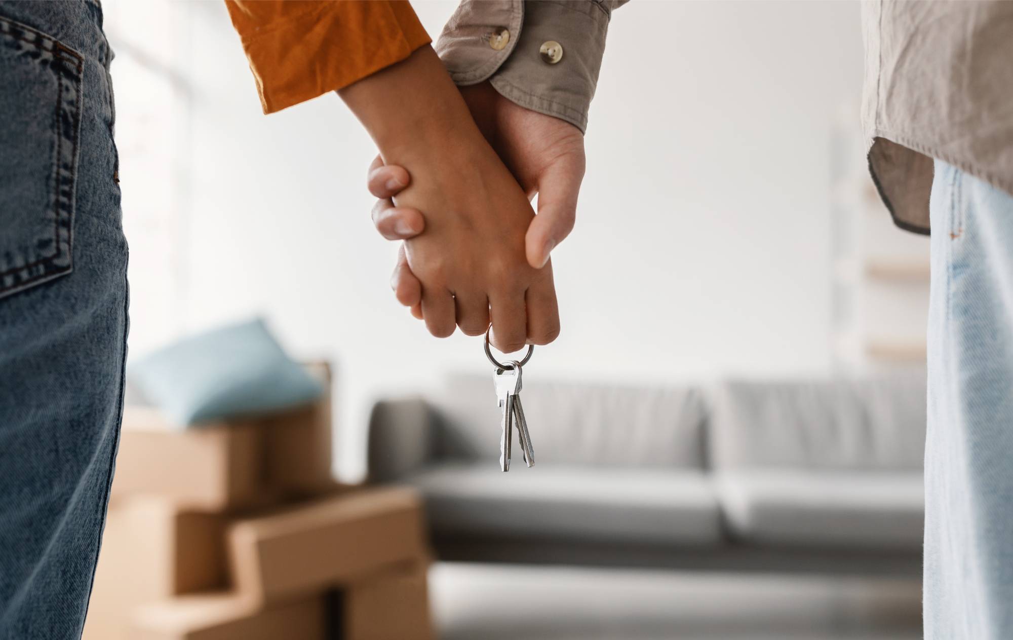 couple holding house keys
