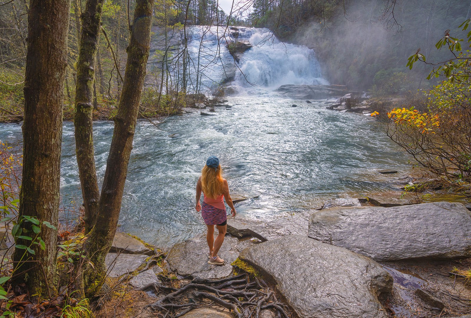 Woman,Relaxing,By,Beautiful,Waterfall.,High,Falls,Of,Dupont,State