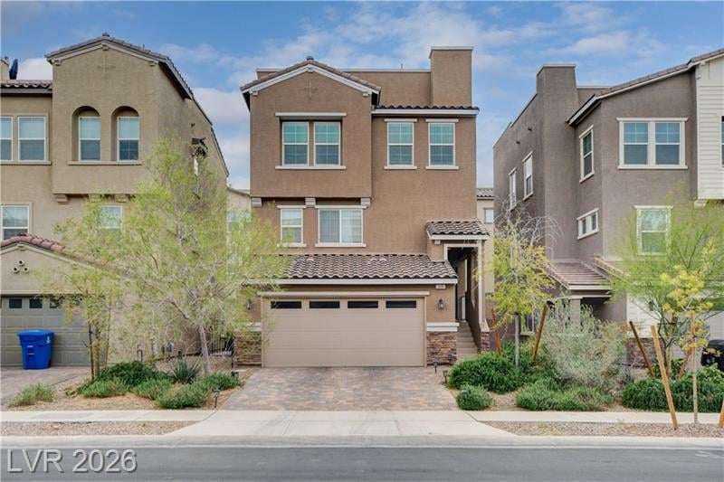 Front exterior of 105 Campbelltown Avenue, a three-story home in Cadence, Henderson NV