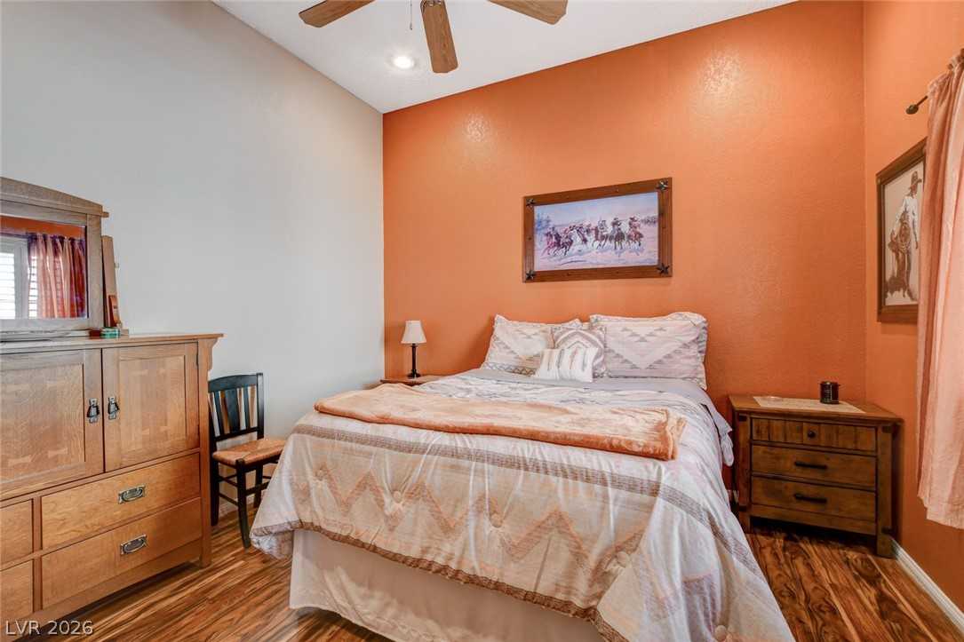 Bedroom with ceiling fan at 5020 Pacific Grove Drive