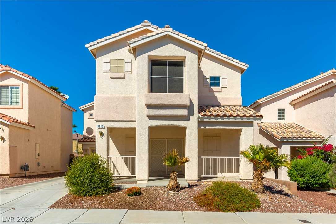 Front exterior of 9010 Mossy Hollow Avenue, a two-story home in northwest Las Vegas