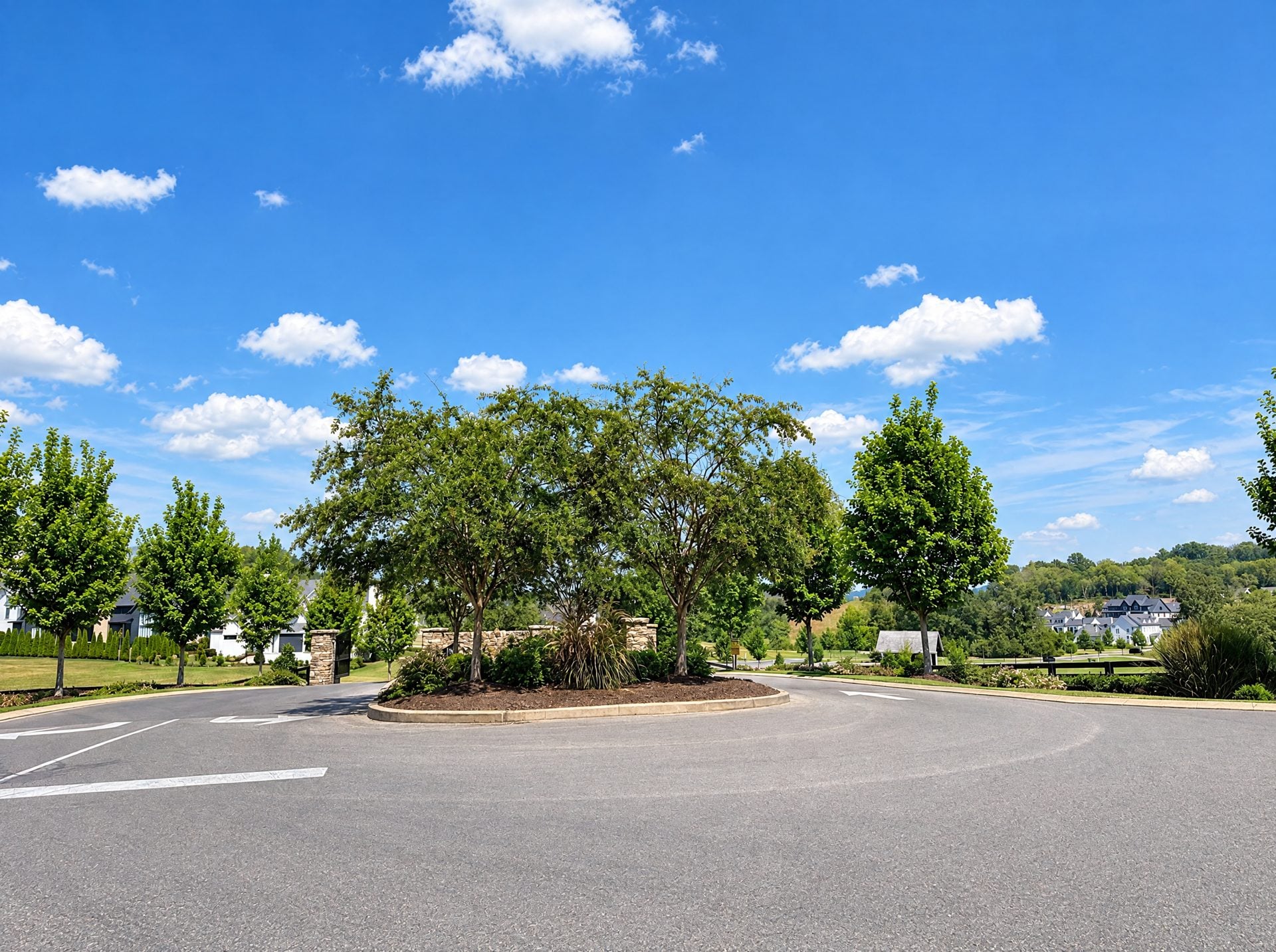 Landscaped neighborhood entrance island in College Grove, TN