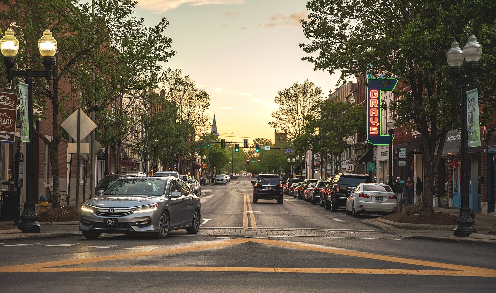 Main Street in downtown Franklin, TN looking toward the church steeple at sunset