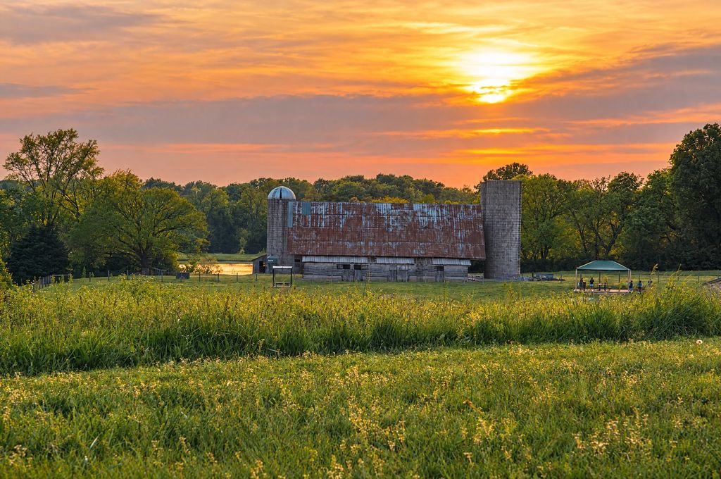 Sunset over a field and barn near Franklin, TN