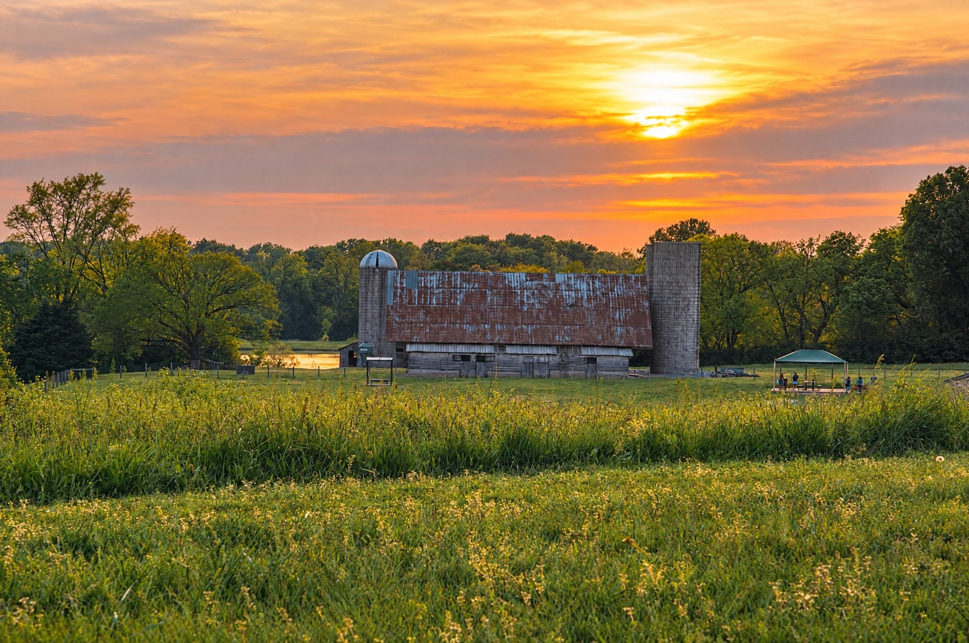 Sunset over a field and barn near Franklin, TN