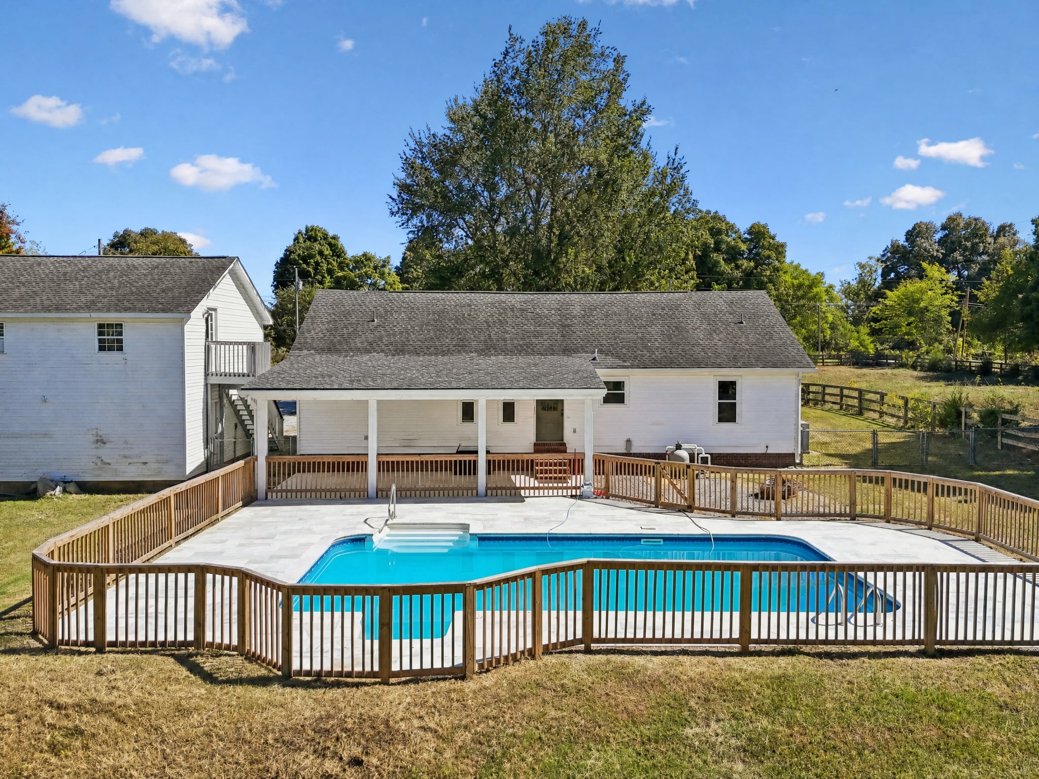 In-ground pool, fenced deck and house on 1.01 acres at 4670 Lunns Store Rd, Chapel Hill TN